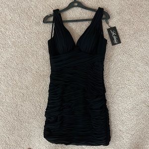 NWT LA femme mini black dress V- neck